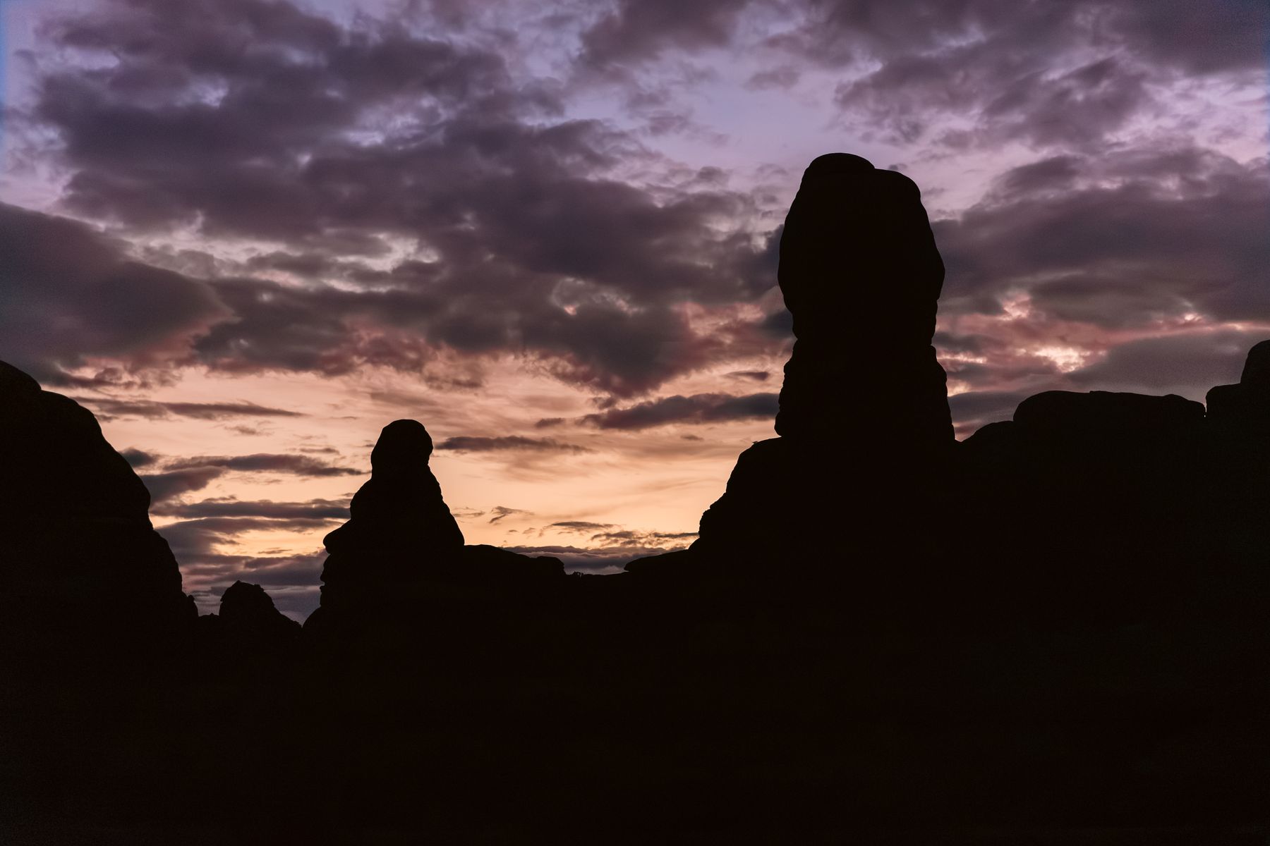 Silhouettes of Predawn Rock Formations